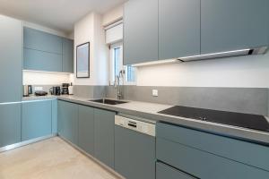 Casa Civique A Modern City Apartment with Balcony, Parking, Aircon & Elevator