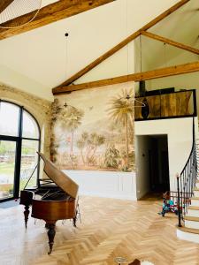 Sejours chez l'habitant Grande chambre privee au Domaine Laroze : photos des chambres