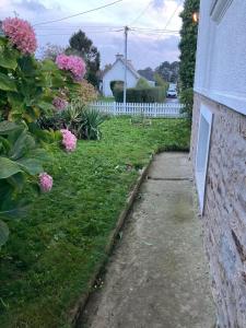 Maisons de vacances Maison Plestin proche plage et GR 34 avec Jardin : photos des chambres