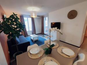 Appartements L'Olivier - Piscine et climatisation : photos des chambres