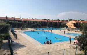 Cozy apartment with private garden in Bibione