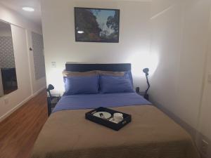 Studio tipuana, varandinha aberta com rede