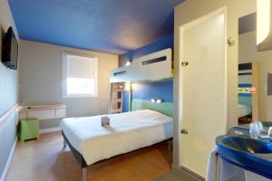 Hotels ibis budget La Roche Sur Yon Vendespace : photos des chambres