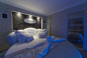Appartements L-Etoile VIP AVEC JACUZZI : photos des chambres
