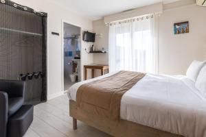 Hotels Hotel de la Plage : photos des chambres