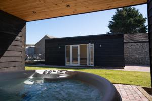 Church Road Retreats - 4-stjärniga hotell i Kessingland