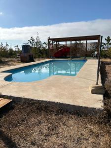 Cabaña con Piscina Guanaqueros