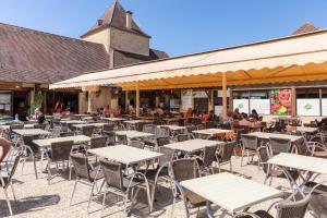 Maisons de vacances Camping Saint Avit Loisirs : photos des chambres