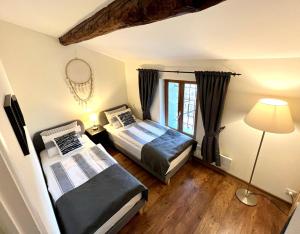 Appartements Les Petites Ecuries - Gite Ponpon : photos des chambres