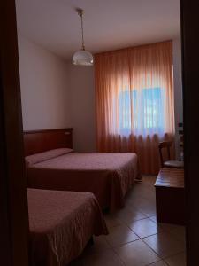 Triple Room room in Grifone Hotel Ristorante