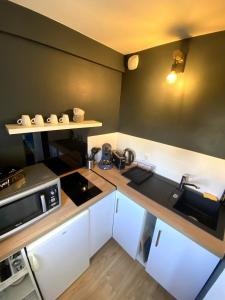 Appartements L-Estrade, Studio centre-ville : photos des chambres