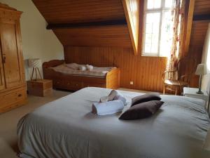 Maisons de vacances Jolie maison en pierre proche de la plage d-Omaha : photos des chambres