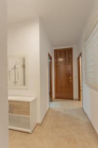 Aloreña 2 con balcones al la calle Real