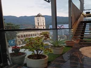 The Clock Tower Rooms & Cafe