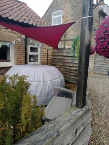 Larch Cottage Ruston with hot tub, dogs go free