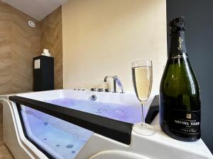 Appartements E4 Reton Suite avec Balneo T2 au couur d Epernay : photos des chambres