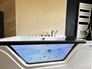 Appartements E4 Reton Suite avec Balneo T2 au couur d Epernay : photos des chambres