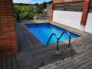 House with outdoor spaces and pool