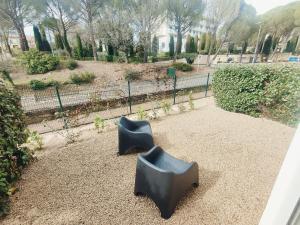 Appartements Le Baou Beni - Piscine, Climatisation & Parking : photos des chambres