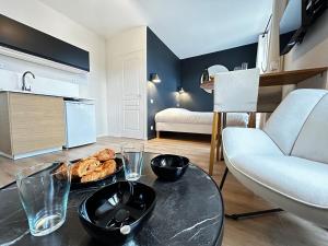 Appartements E2 Reton Studio Cosy proche du centre-ville : photos des chambres