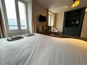 Appartements E2 Reton Studio Cosy proche du centre-ville : photos des chambres