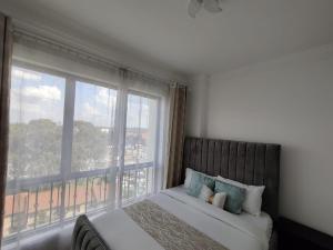 charming urban retreat apartment with private parking,fully equipped gym ,children playing ground and unbeatable city views