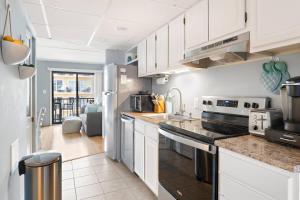 Boardwalk Condo with Ocean View Balcony & Pool