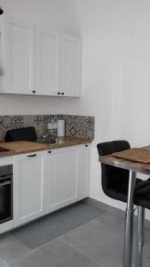 Appartements Studio La fleur de Lys : photos des chambres