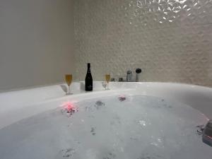 Appartements E1 Reton magnifique T3 RDC terrasse et jacuzzi : photos des chambres
