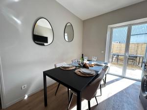 Appartements E1 Reton magnifique T3 RDC terrasse et jacuzzi : photos des chambres