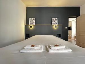 Appartements E1 Reton magnifique T3 RDC terrasse et jacuzzi : photos des chambres