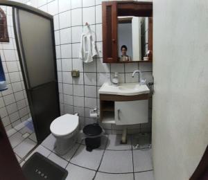 Suíte Nostalgia Ar refrigerado TV55" Canais free Pousada Tijucas Lua Encantada