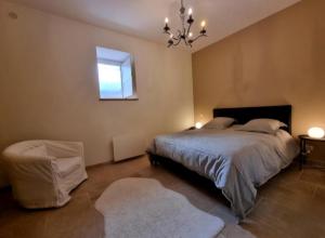 Appartements LA MAISON VALENTIN AU COEUR DE LA CITE MEDIEVALE : photos des chambres