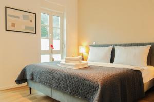 Moderne 3-Schlafzimmer-Apartments mit Balkon & Aufzug bis 6 Personen