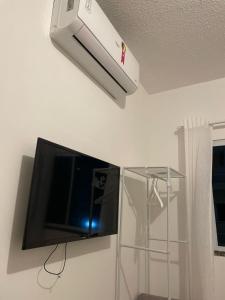 Apartamento aconchegante com piscina à 4km da Praia de Aruana