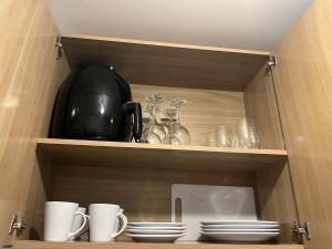 Apartamento aconchegante com piscina à 4km da Praia de Aruana