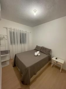 Apartamento aconchegante com piscina à 4km da Praia de Aruana