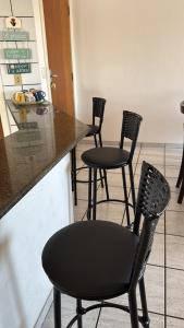 Apartamento Guarapari pé na areia com Wi-Fi e Garagem