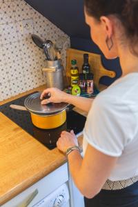 Appartements Le Perchoir, avec parking, face aux Thermes : photos des chambres