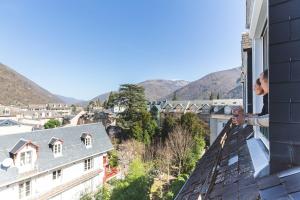 Appartements Le Perchoir, avec parking, face aux Thermes : photos des chambres