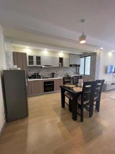 modern living apartment with heated swimming pool ample parking space, fully equipped gym and a relaxing rooftop with amazing city views