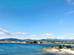 Holibai, Mariño, Viva la Experiencia del Mar Desde su Terraza, Baiona, Galicia