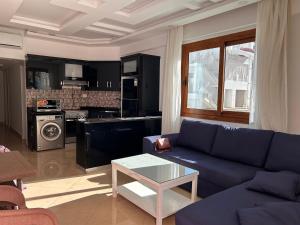 3-Bedroom Apartment on the Ground Floor with Pool View, Personal Garden Area, Backyard, and Free Beach Access in Sharm Hills Resort