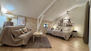 Appartements La Grange Du Moulin De Tauran : photos des chambres