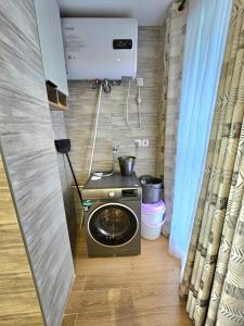 elegant urban escape apartment with heated swimming pool, fully equipped gym,children playing ground,amazing city views and private parking space