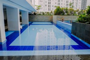 Comfort and Restful 2BR at Bassura City Apartment By Travelio