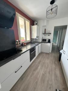 Appartements L Elegant Cozy Plein Centre : photos des chambres