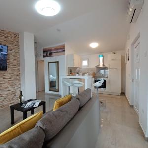 Beachfront Apartment with Balcony and Sea View