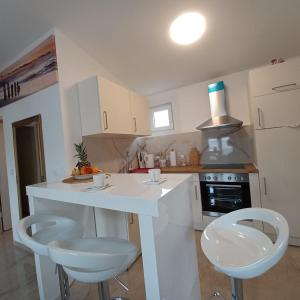 Beachfront Apartment with Balcony and Sea View