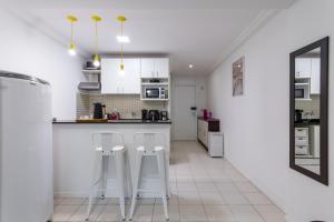 Apartamento em Camboinhas com piscina, ar-condicionado e garagem